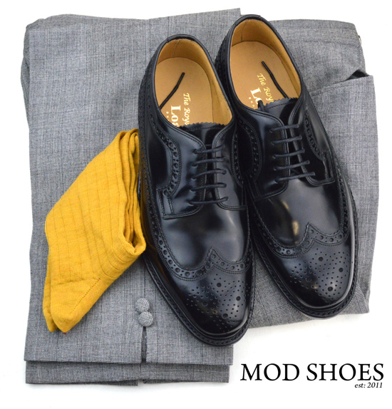 mod shoes loake black royals with prince of wales check trousers and mustard coloured socks