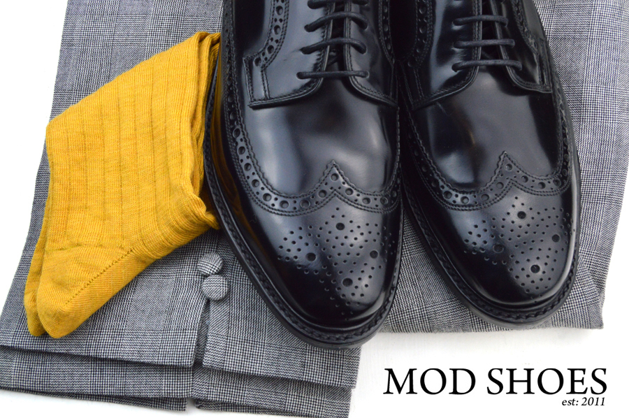 mod shoes loake black royals with prince of wales check trousers and mustard socks