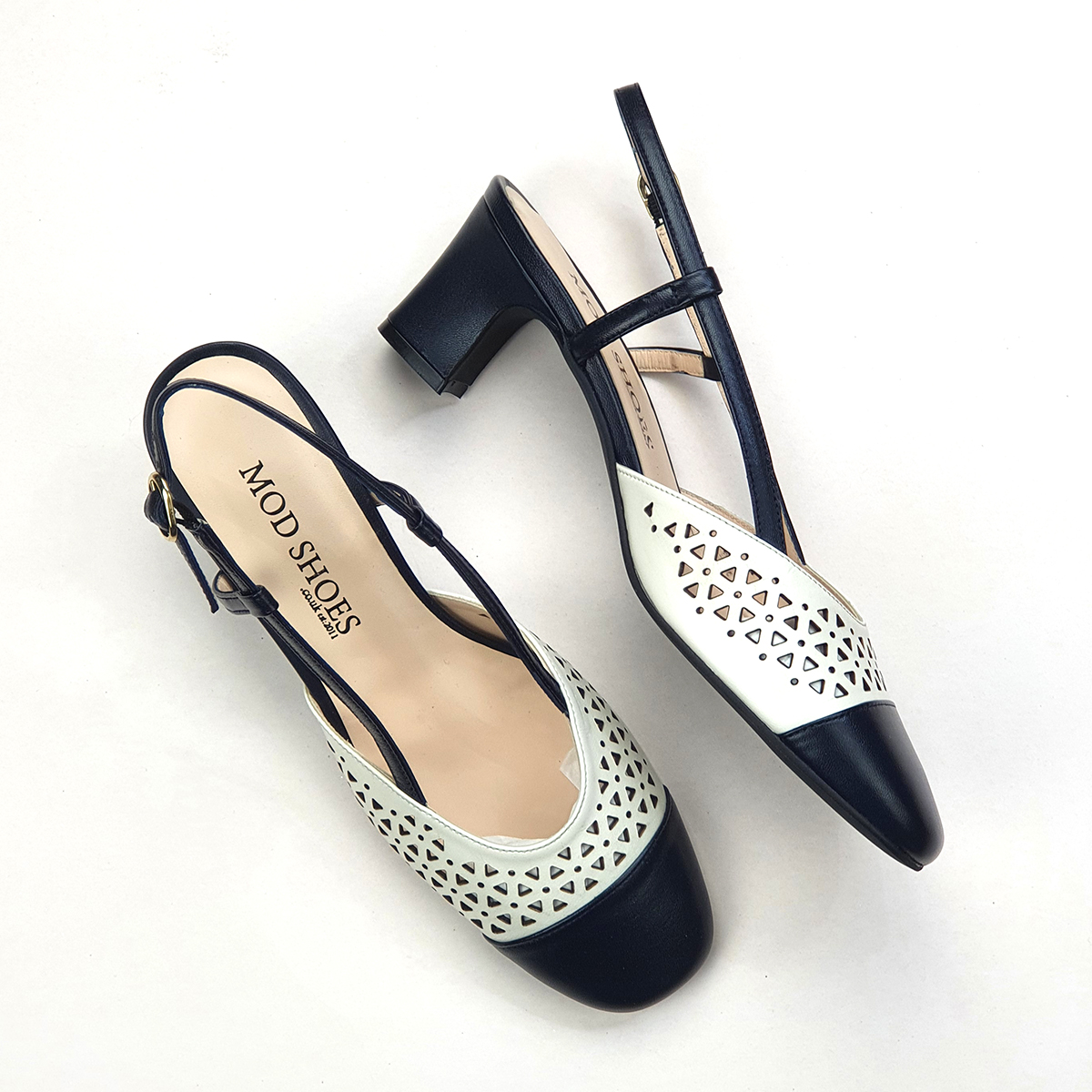 navy and cream shoes