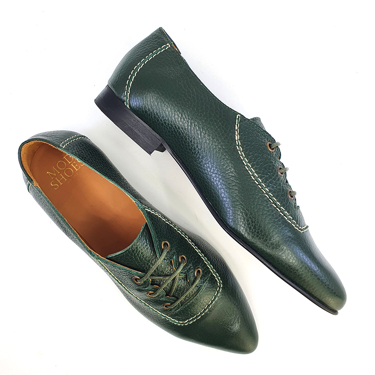 green leather trainers